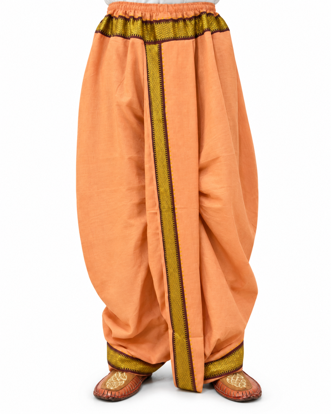 Peach cotton-blend dhoti with decorative border, waist 28–40 inches, front view with legs and footwear visible